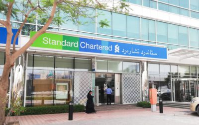 standard chartered jobs cut
